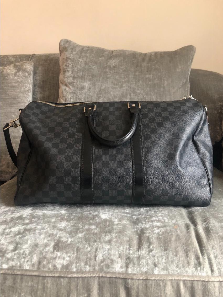 louis vuitton black holdall