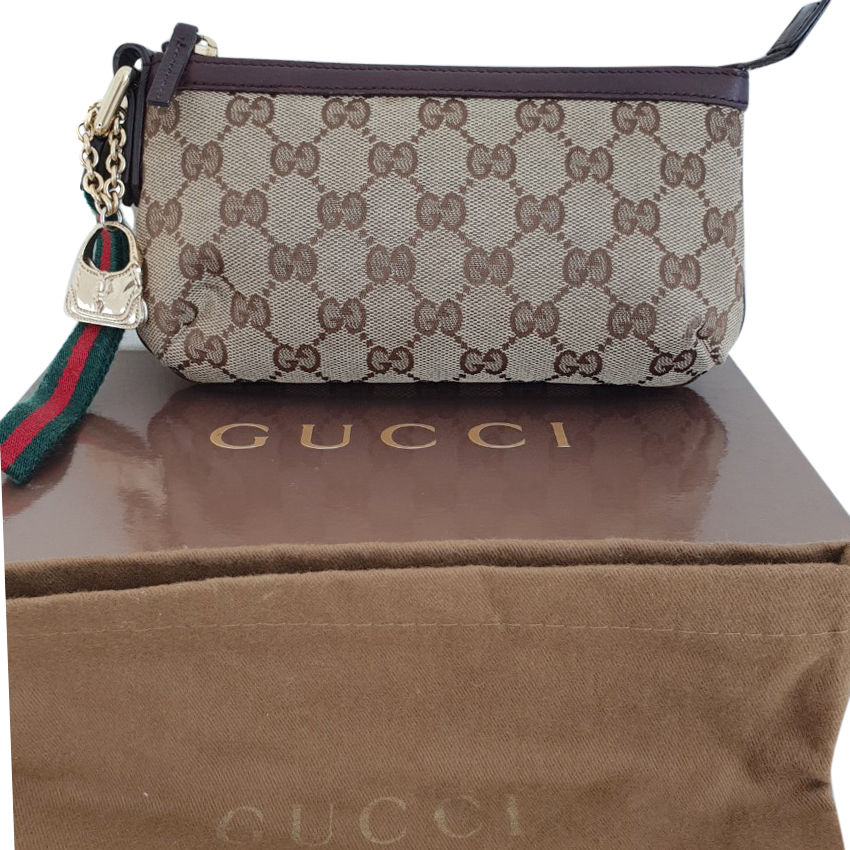 gucci clutch monogram