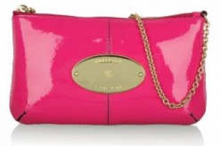 neon pink patent clutch bag