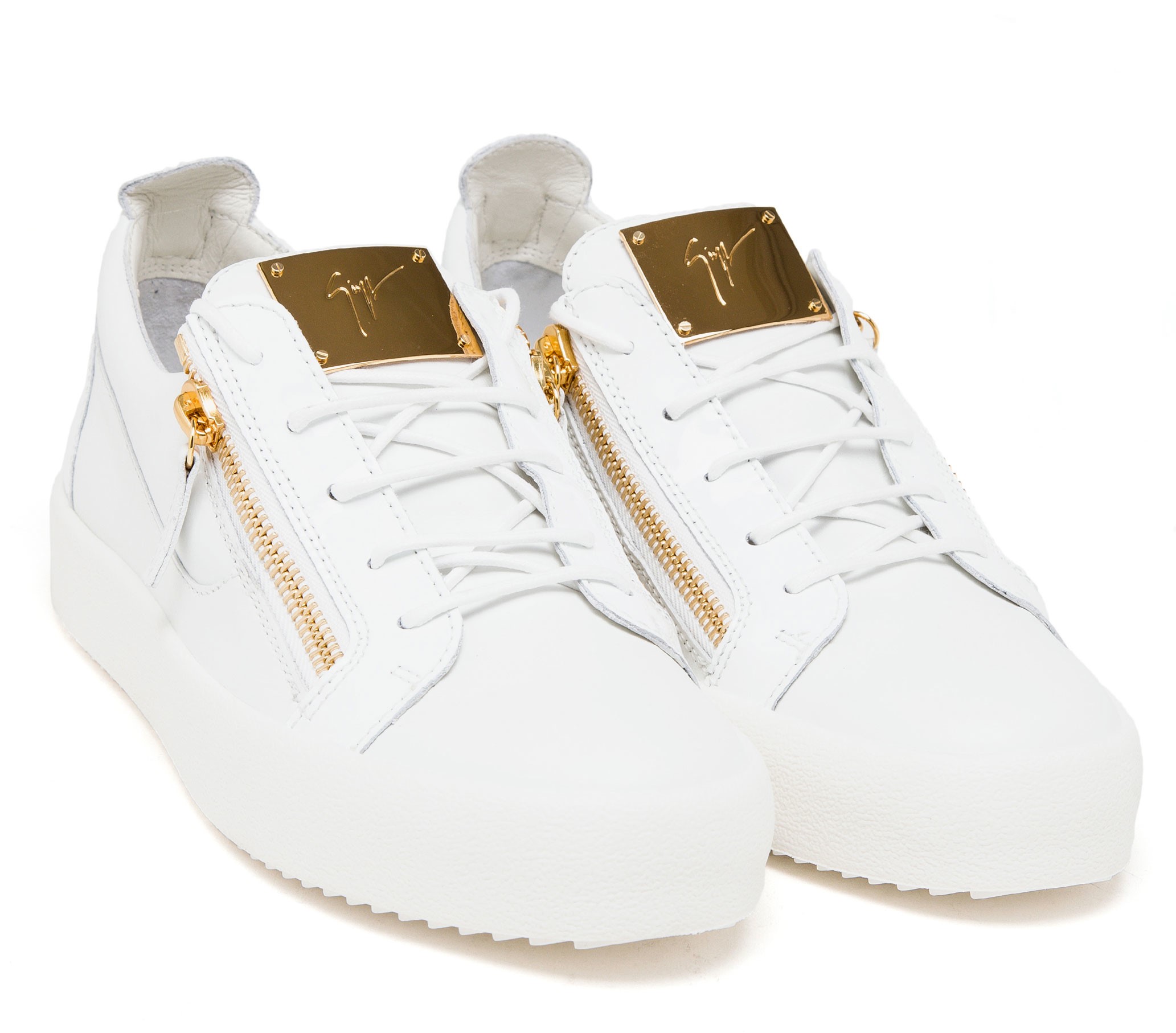 white trainers with gold zip
