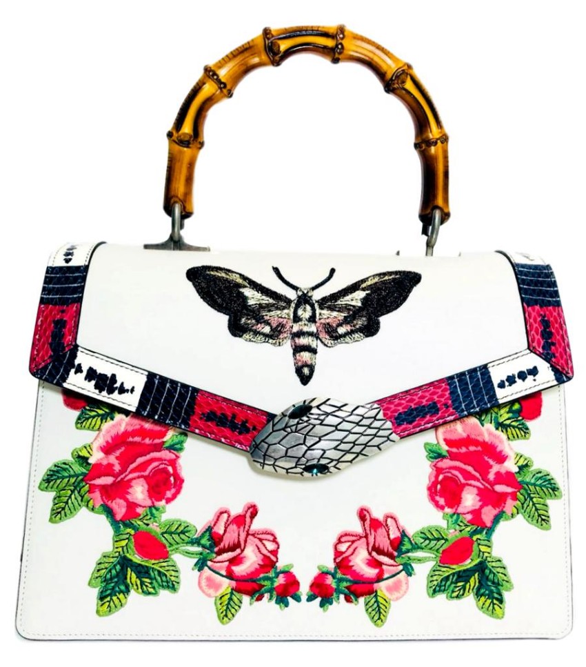 white gucci bag with butterfly