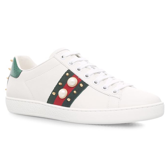 white trainers with green and red stripes