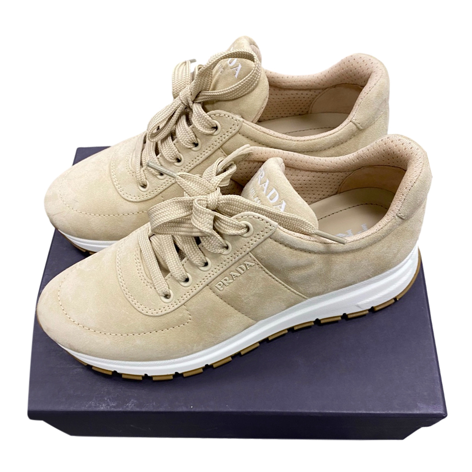 beige prada trainers