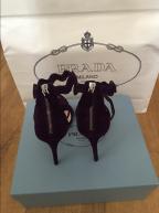 prada scalloped heels gold